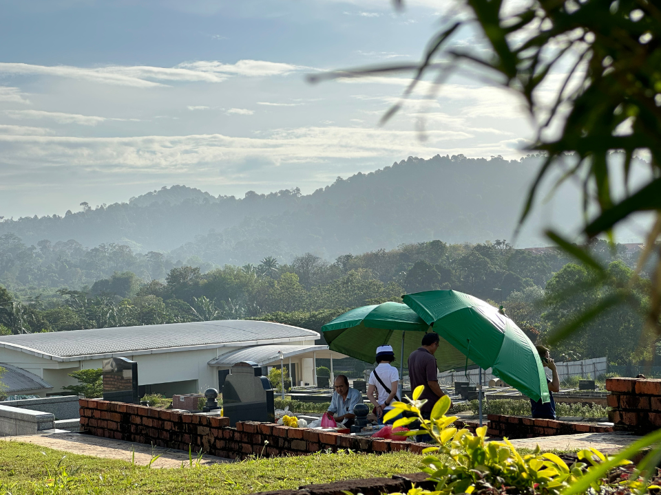 Praying at Burial Plot
